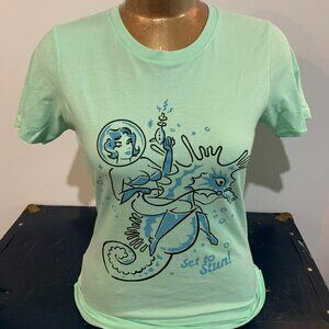 Mint green Rock steady tshirt. Retro lady riding a sea horse.